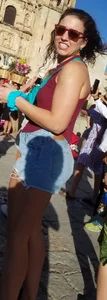 Laughing girl in shorts, legs and thick peach