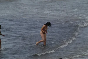 Girls on a nude beach in Sitges, Spain