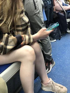 Very cute candid girl with very pale skin sitting in a subway train creepshots