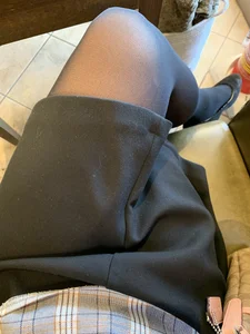 Candid College Teen's Legs in a Skirt And Black Pantyhose Selfie at a Desk in a Classroom