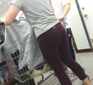 Short and cute brunette changing her shirt while in lulu's with vtl