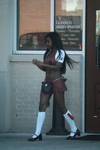 Sexy ebony Tilted Kilt employee in her uniform
