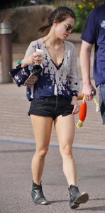 Cutie walking her dog in short denim shorts and showing a bit of cheek