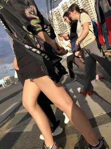 Cute blonde candid teen crossing the street