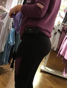 Pink employee with a perfectly round ass in leggings