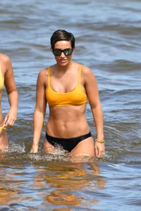 Frankie Bridge nip slips in a bikini on the beach