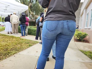 Ebony in jeans  in the voting line