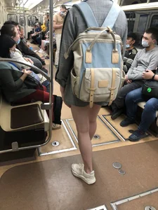Cute Girl in Shorts and Sneakers With Hot Legs in Subway Train Creepshots Gallery