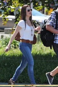 Beautiful brunette girl out in tight jeans