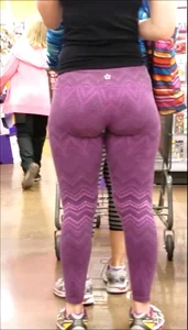 Thick Blonde in purple leggings