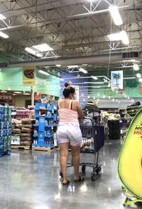 Thick Latina babe with a nice ass in tight patterned shorts