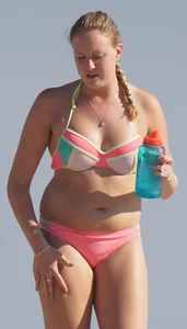 Thick blonde bikini babe on the beach