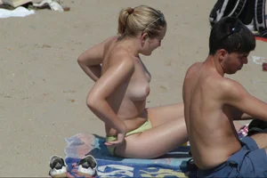 Girls on a nude beach in Sitges, Spain