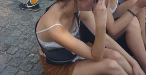 Pretty girl downbloused showing her puffy nipples and bonus friend with nice cleavage
