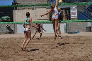Beach volleyball blonde looking sexy and showing her body off