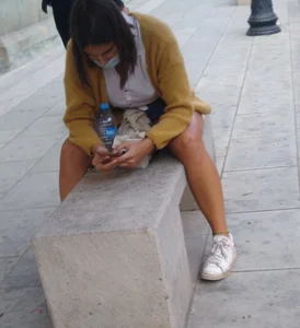 Long-legged girl, distracted