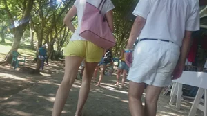 Milf in yellow shorts with vpl and a wedgie