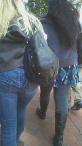 Blonde in tight jeans with her red thong sticking out