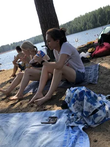 Group of Girls in Swimsuits at a Lake Beach