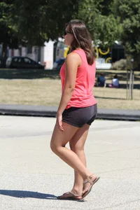 Thick girl in pink top and black shorts with vpl