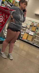 Almost busted by target security for this meaty mom showing cheeks