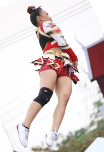 Bunch of athletic Thai cheerleaders at a competition