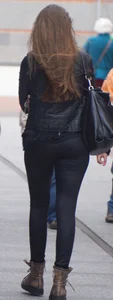 Pretty girl walking in tight black pants