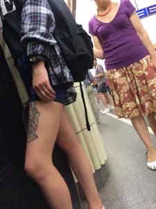 Hot Legs with a Tattoo in Subway Candid Closeup