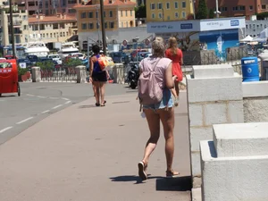 Candid cheeky blonde in short jean shorts looking hot