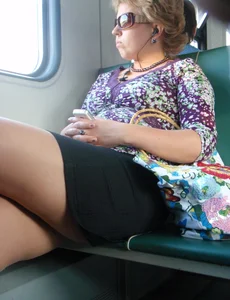 Sexy girls in skirts, stockings and upskirts on the train