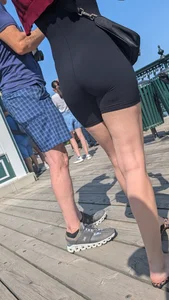 Very slim asian in black short legging. (VPL) OC