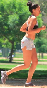 Ebony babe in Hooters shorts out for a run and walk
