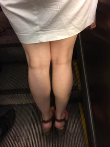 Girl in Sandals on High Heels in a Skirt Subway Escalator Creepshot