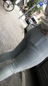 Fat ass in light jeans