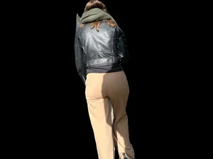 Candid girl in a leather jacket and pants with VPL street creepshots