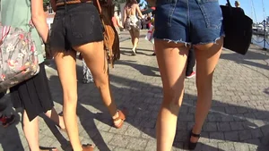 Two Hot Candid Girls in Shorts and Great Legs Walking Down the Street Creepshot