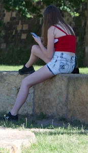 Pretty candid girls with nice legs sitting in denim shorts