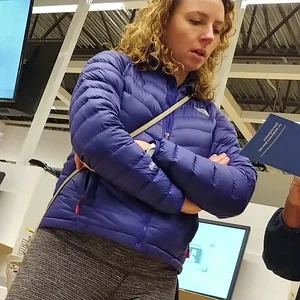 Blonde lady shopping in tight dark grey leggings