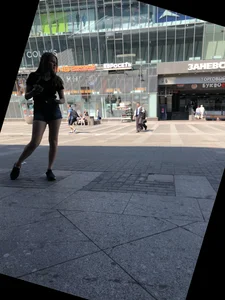 Cute Girl Distributing Leaflets in Shorts City Candid Gallery
