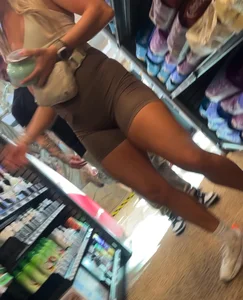 Blondie shopping with bf in her tight shorts