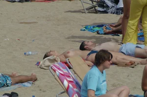 Topless girls on a beach in Barcelona