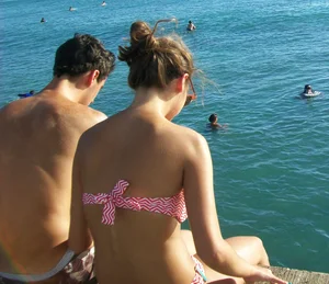 Sexy girl in red and white bikini on vacation