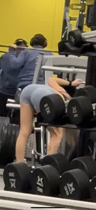 Petite blonde with bubble butt in blue spandex shorts