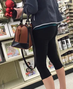 Sexy lady shopping at Walmart in leggings