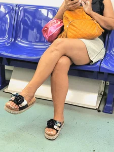 Candid Girl Sitting in a Public Bus With Crossed Legs And Feet in Flip-Flops Creepshot