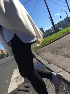 Blonde Girl With Fit Muscular Legs in Tight Black Jeans and Sneakers on a Crosswalk  - Street Creepshots Collection