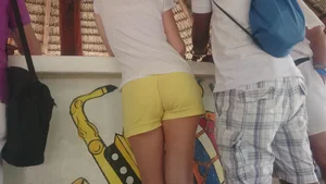 Milf in yellow shorts with vpl and a wedgie