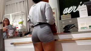 Candid ebony babe with an amazing ass and vpl in grey Nike spandex shorts
