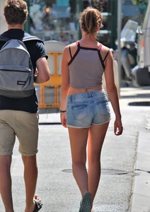 Beautiful teen out with boyfriend in short jean shorts