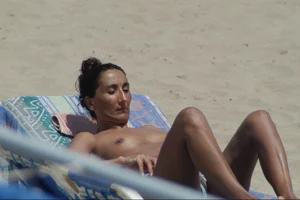 Girls on a nude beach in Sitges, Spain